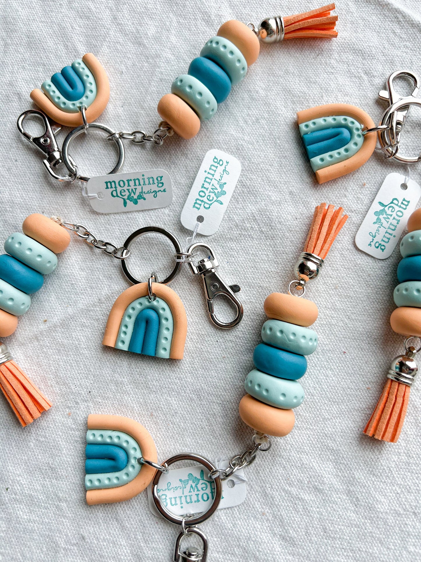Tangerine, Sky Blue, and Turquoise Rainbow Keychain