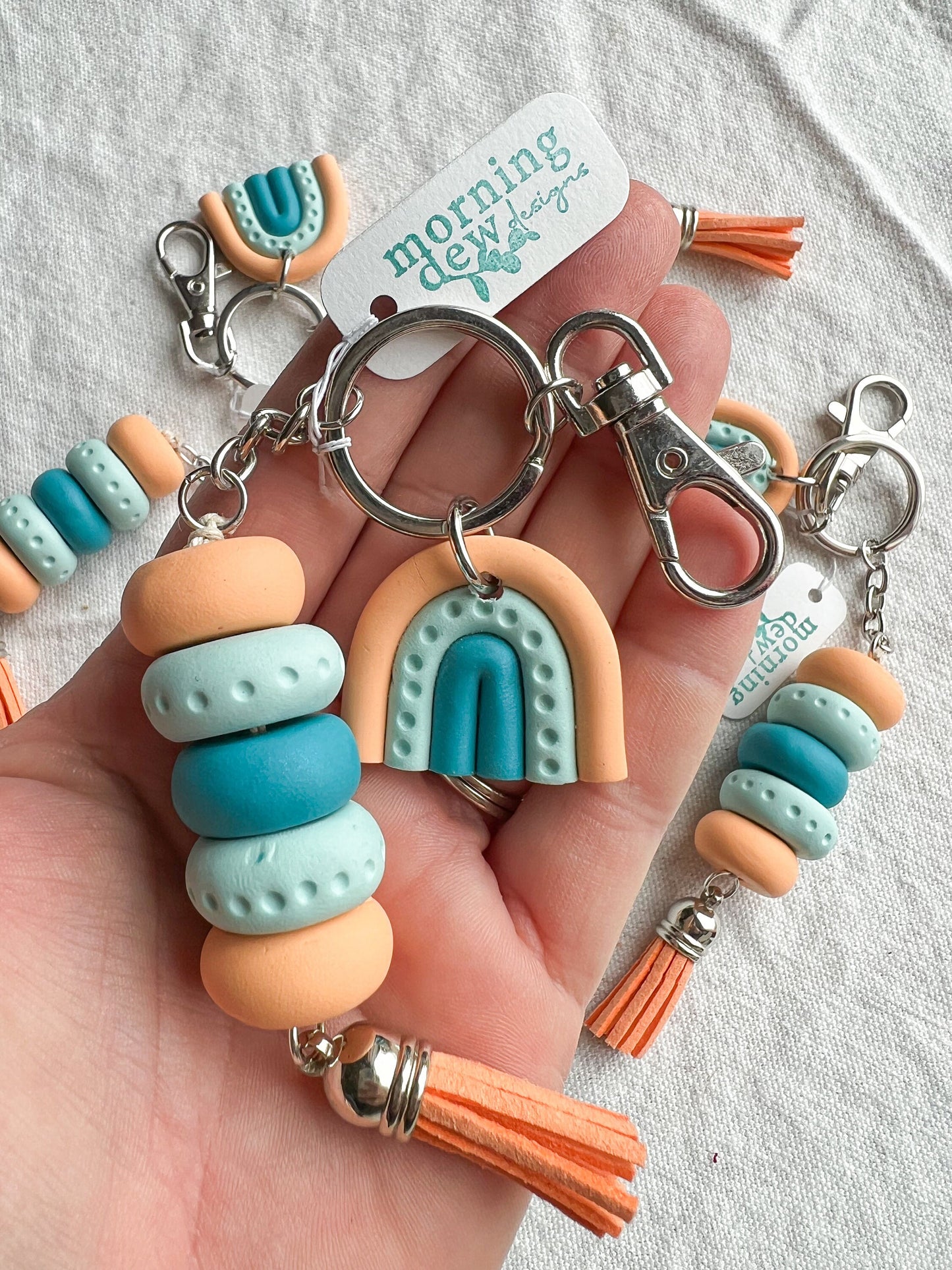 Tangerine, Sky Blue, and Turquoise Rainbow Keychain