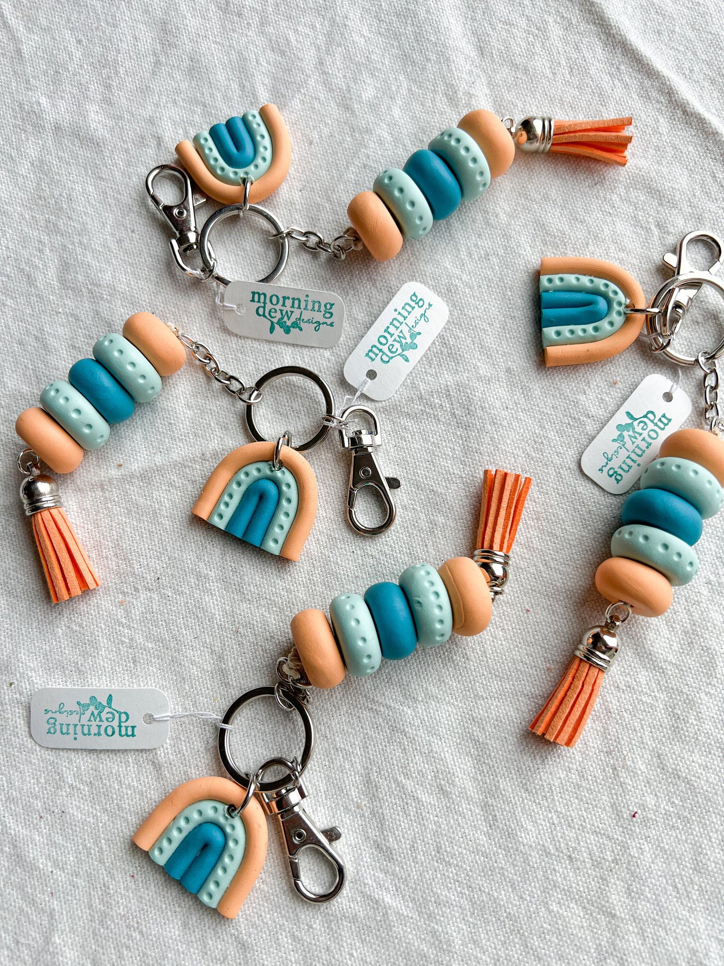 Tangerine, Sky Blue, and Turquoise Rainbow Keychain